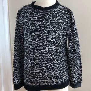 Long sleeve black shirt w/ white text bubbles